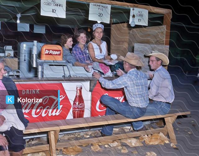 [colorized] Cowboys enjoy the food at the West Texas Fair in Abilene, 1957