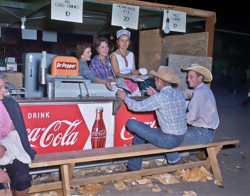 [colorized] Cowboys enjoy the food at the West Texas Fair in Abilene, 1957