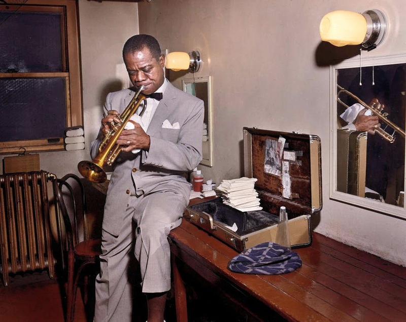 [colorized] Louis Daniel Armstrong, an American trumpeter and vocalist. He was among the most influential figures in jazz.