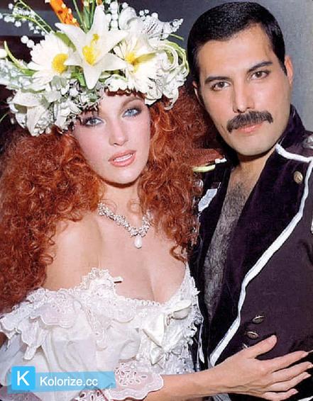 [colorized] Jane Seymour with Freddie Mercury at Fashion Aid, 1985