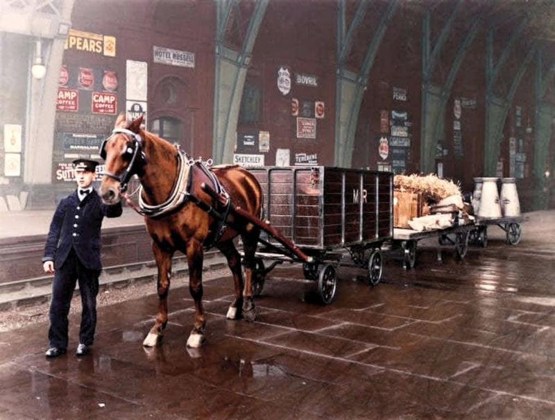 [colorized] A Photograph of Horse drawn drays at St Pancras station 1912. 