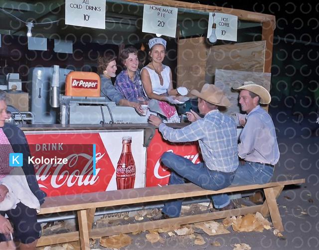 [colorized] Cowboys enjoy the food at the West Texas Fair in Abilene, 1957