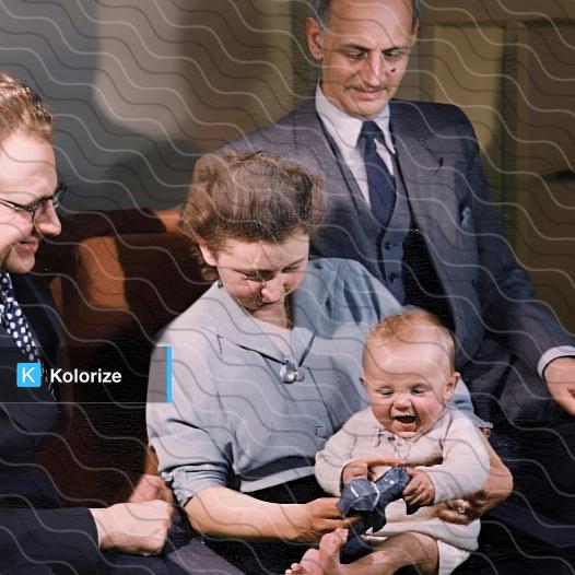 [colorized] Otto Frank with Jan and Miep Gies and their son Paul, Amsterdam, 1951 