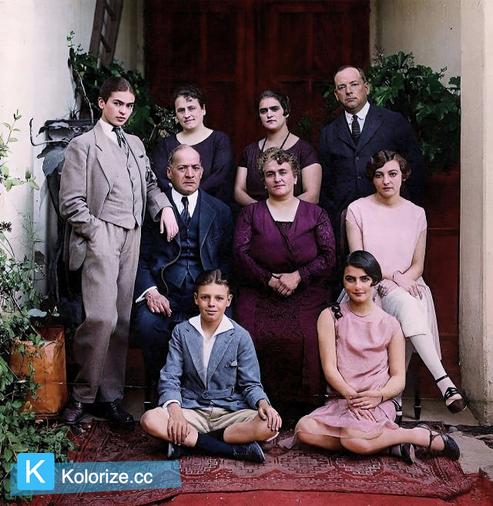 [colorized] A 17-year old Frida Kahlo poses for a family photo wearing a traditional gentleman's 3-piece suit, 1924.