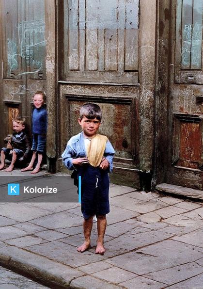 [colorized] A photograph of an East End child, London, in 1926.