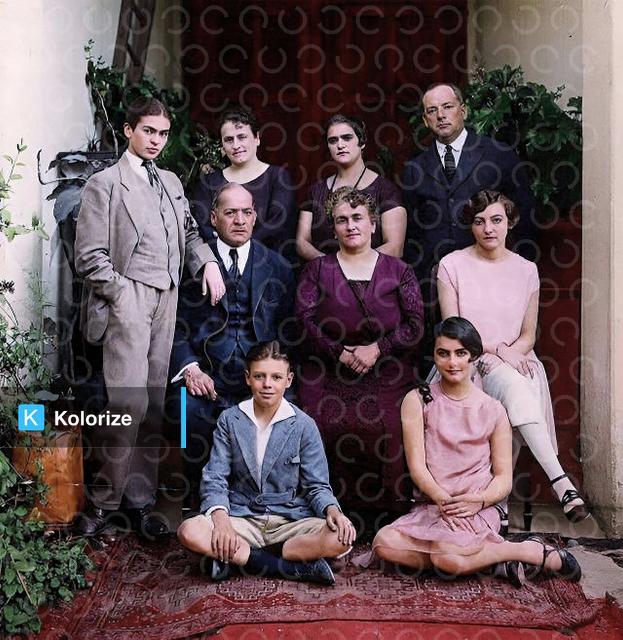 [colorized] A 17-year old Frida Kahlo poses for a family photo wearing a traditional gentleman's 3-piece suit, 1924.