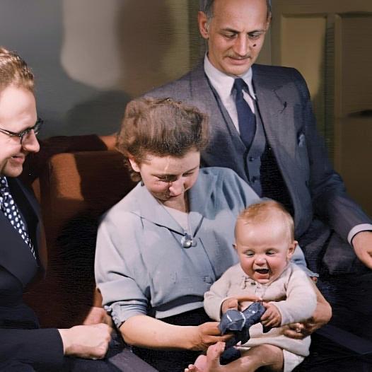 [colorized] Otto Frank with Jan and Miep Gies and their son Paul, Amsterdam, 1951 