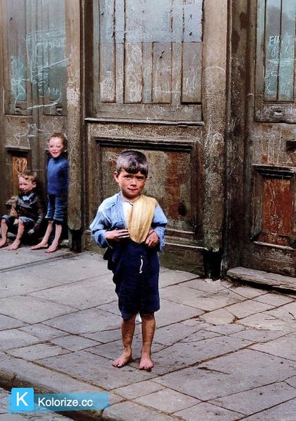 [colorized] A photograph of an East End child, London, in 1926.