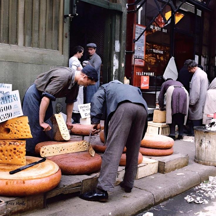 [colorized] Cheese wheels at Halles de Baltard.
1938. Paris