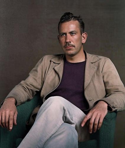 [colorized] US novelist John Steinbeck (1902 – 1968).