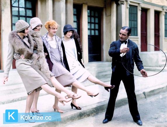 [colorized] Louise, Nancy Phillips, Josephine Dunn and Doris Hill get their kicks on the set of Rolled Stockings (1927) as James Hall looks on.
