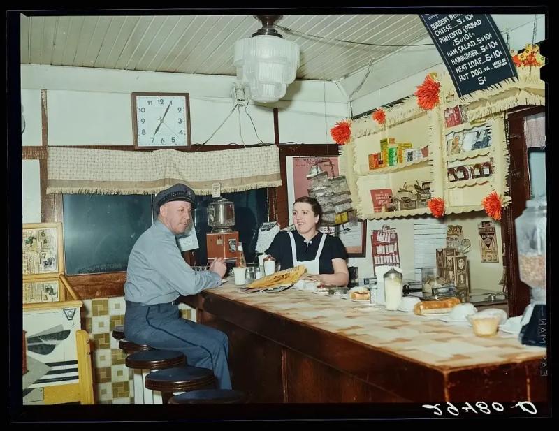 [colorized] Truck driver in diner. Clinton, Indiana. Photo by Arthur Rothstein, 1940.