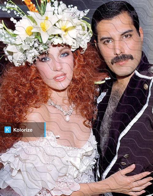 [colorized] Jane Seymour with Freddie Mercury at Fashion Aid, 1985