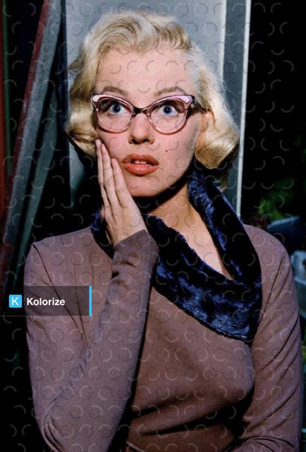 [colorized] Marilyn Monroe in her glasses, 1952.